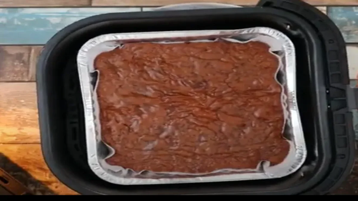 Air Fryer Brownies Fudgy air fryer brownies with a crackly top, cut into squares and served on a plate, perfect for a rich and easy dessert.