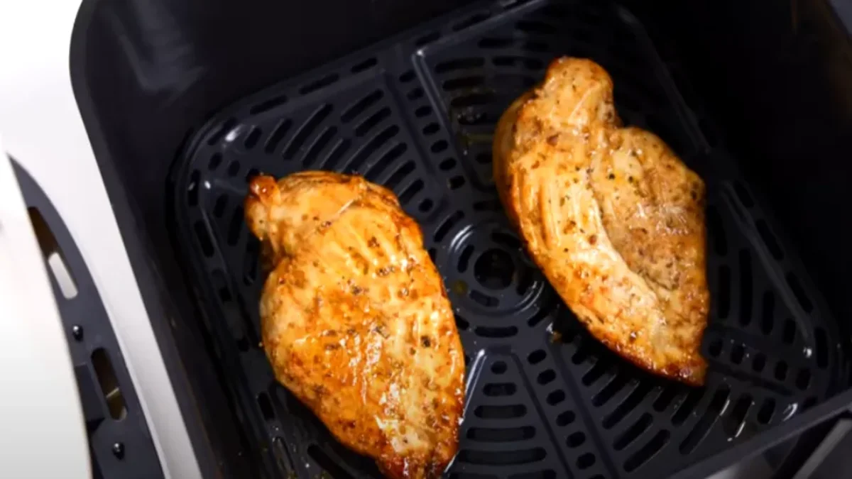 chicken breast recipe air fryer Perfectly cooked air fryer breast fillets with a golden crust and juicy center, sliced and served with fresh herbs or vegetables.